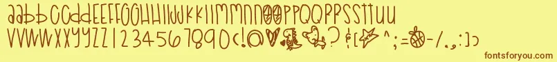Poodledoodles Font – Brown Fonts on Yellow Background