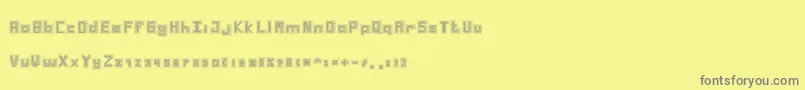 Czcionka Dotgrid – szare czcionki na żółtym tle