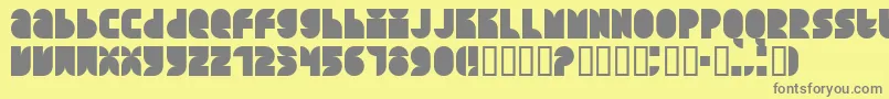 フォントQuarterroundSolid – 黄色の背景に灰色の文字