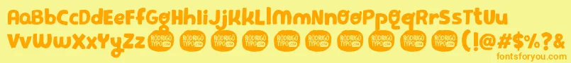 PequeРґa Font – Orange Fonts on Yellow Background