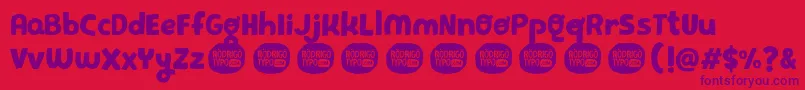 PequeРґa Font – Purple Fonts on Red Background
