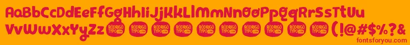 PequeРґa Font – Red Fonts on Orange Background
