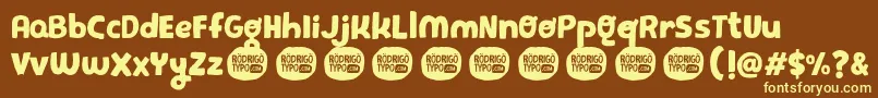 PequeРґa Font – Yellow Fonts on Brown Background