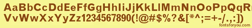 フォントGrotesquemtstdBold – 茶色の文字が黄色の背景にあります。