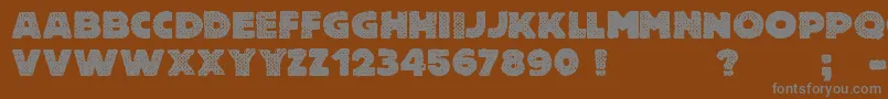 FreeThinkingsMurder Font – Gray Fonts on Brown Background