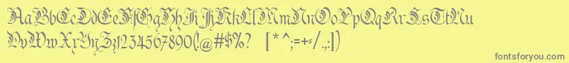 フォントKanzler – 黄色の背景に灰色の文字