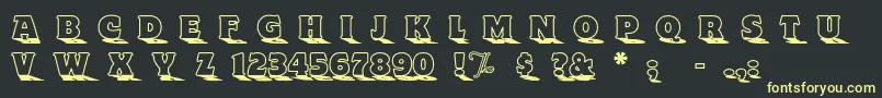 Toyland Font – Yellow Fonts on Black Background