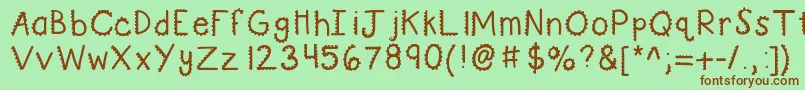 Fonte Kbturninggears – fontes marrons em um fundo verde