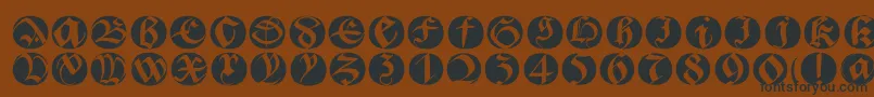 Bastardabuttons Font – Black Fonts on Brown Background