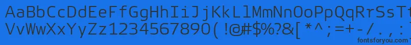 Шрифт ElektraMonoLightPro – чёрные шрифты на синем фоне