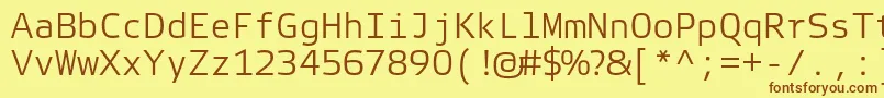 Шрифт ElektraMonoLightPro – коричневые шрифты на жёлтом фоне