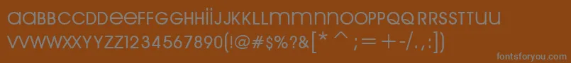 Шрифт ArriпїЁreGarde – серые шрифты на коричневом фоне