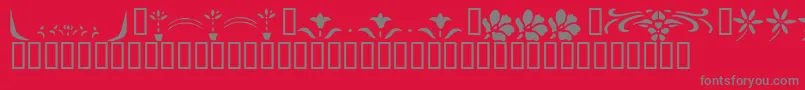 フォントKrFleurFlairLines2 – 赤い背景に灰色の文字