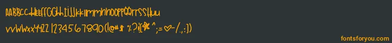 フォントSunnydaysinla – 黒い背景にオレンジの文字