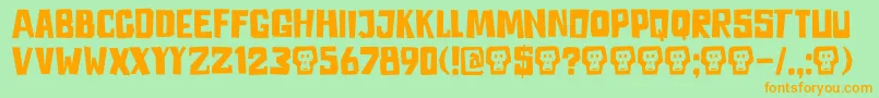 フォントDkAstromonkey – オレンジの文字が緑の背景にあります。