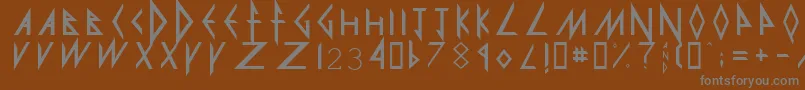 DefLeppard-Schriftart – Graue Schriften auf braunem Hintergrund