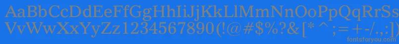 フォントQuoVadis – 青い背景に灰色の文字