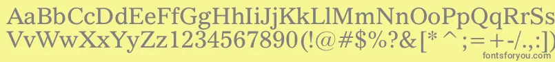 フォントQuoVadis – 黄色の背景に灰色の文字