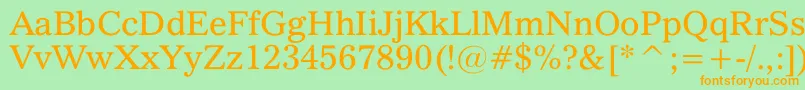 フォントQuoVadis – オレンジの文字が緑の背景にあります。