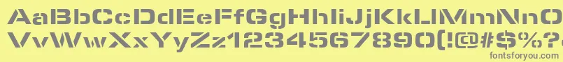 MicrostencilBlackRegular Font – Gray Fonts on Yellow Background