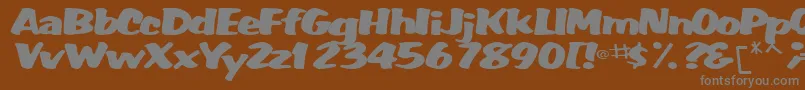 WummerlinscriptsskBold Font – Gray Fonts on Brown Background