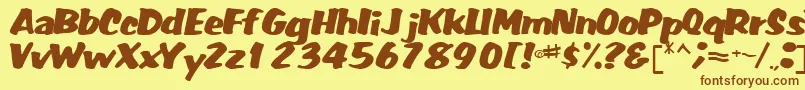 フォントFatRegularTtnorm – 茶色の文字が黄色の背景にあります。