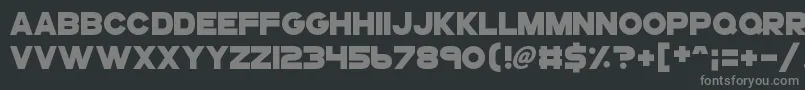 Gogoposterpunch-fontti – harmaat kirjasimet mustalla taustalla