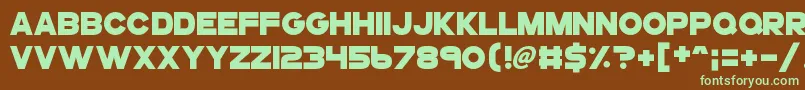Gogoposterpunch-fontti – vihreät fontit ruskealla taustalla