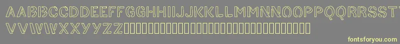 HandStencil Font – Yellow Fonts on Gray Background