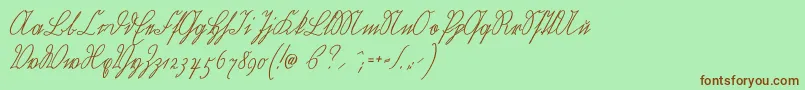 Wiegelkurrentmedium-Schriftart – Braune Schriften auf grünem Hintergrund