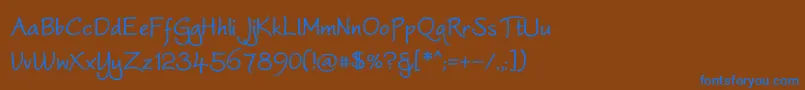 WorstveldBold-Schriftart – Blaue Schriften auf braunem Hintergrund
