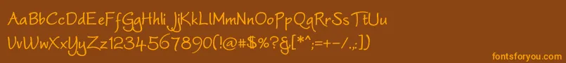 フォントWorstveldBold – オレンジ色の文字が茶色の背景にあります。