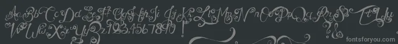フォントMtfUnderYourSkin – 黒い背景に灰色の文字