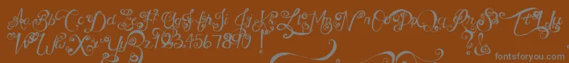 MtfUnderYourSkin-Schriftart – Graue Schriften auf braunem Hintergrund
