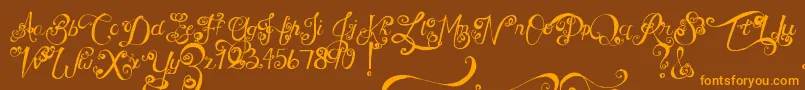 MtfUnderYourSkin-fontti – oranssit fontit ruskealla taustalla