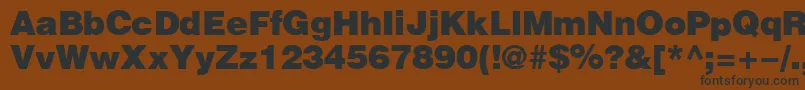 HeliosBlack-Schriftart – Schwarze Schriften auf braunem Hintergrund