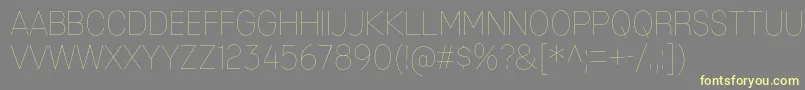 MixolydianTitlingUl-Schriftart – Gelbe Schriften auf grauem Hintergrund