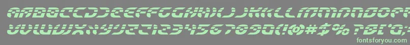 フォントStarfighterlaserboldital – 灰色の背景に緑のフォント