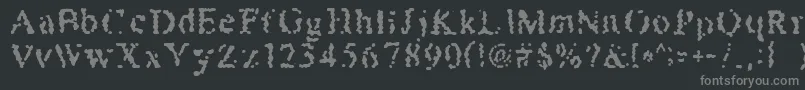 フォントHoneybomb – 黒い背景に灰色の文字