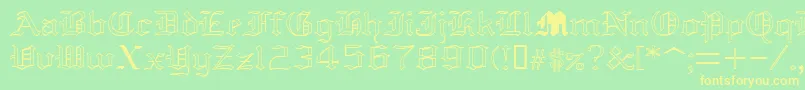 YoldAnglican Font – Yellow Fonts on Green Background