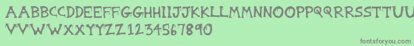 Gorestep Font – Gray Fonts on Green Background