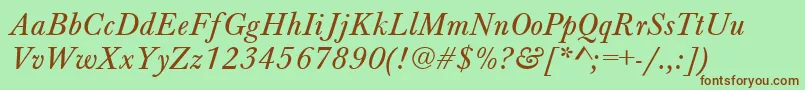 BaskervilleA.ZPsNormalItalic-Schriftart – Braune Schriften auf grünem Hintergrund
