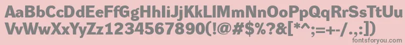 DynagroteskdeBold-fontti – harmaat kirjasimet vaaleanpunaisella taustalla