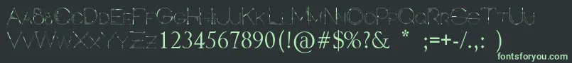 フォントInspira – 黒い背景に緑の文字
