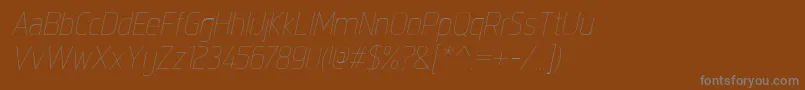 IntropolThinitalic Font – Gray Fonts on Brown Background