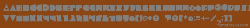 Weitere Informationen zur LfChildsplay-Schriftart LfChildsplay-Schriftart – Graue Schriften auf braunem Hintergrund