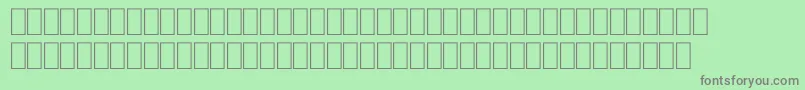 FabreseDemiaSwissCheese-Schriftart – Graue Schriften auf grünem Hintergrund