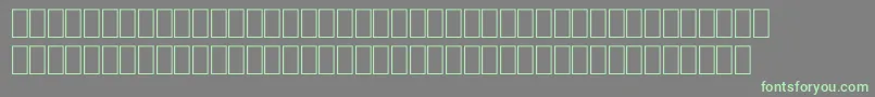 FabreseDemiaSwissCheese Font – Green Fonts on Gray Background