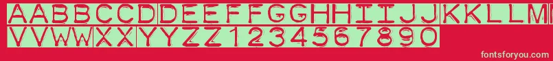 フォントDymofontinvers – 赤い背景に緑の文字