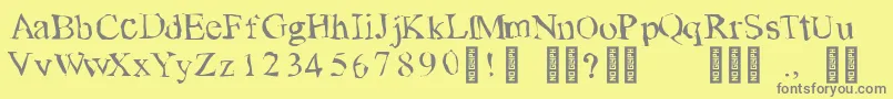 TearsonfreshfruitRegular-fontti – harmaat kirjasimet keltaisella taustalla